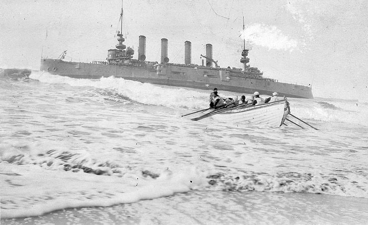 U.S. Naval Historical Center Photograph # NH 46156 "Coast Guard surf boat in action near the wrecked USS Milwaukee, 13 Jan. 1917" U.S. Coast Guard surf boat in action, during the removal of crewmen from USS Milwaukee (Cruiser # 21) after she was wrecked at Samoa Beach, near Eureka, California, 13 January 1917. Note the large number of men standing on the grounded cruiser's decks. U.S. Naval Historical Center Photograph, Public domain, via Wikimedia Commons